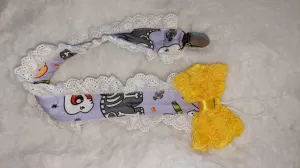 Trick or Treat Dino Plush Ruffle Deluxe Pacifier Clip